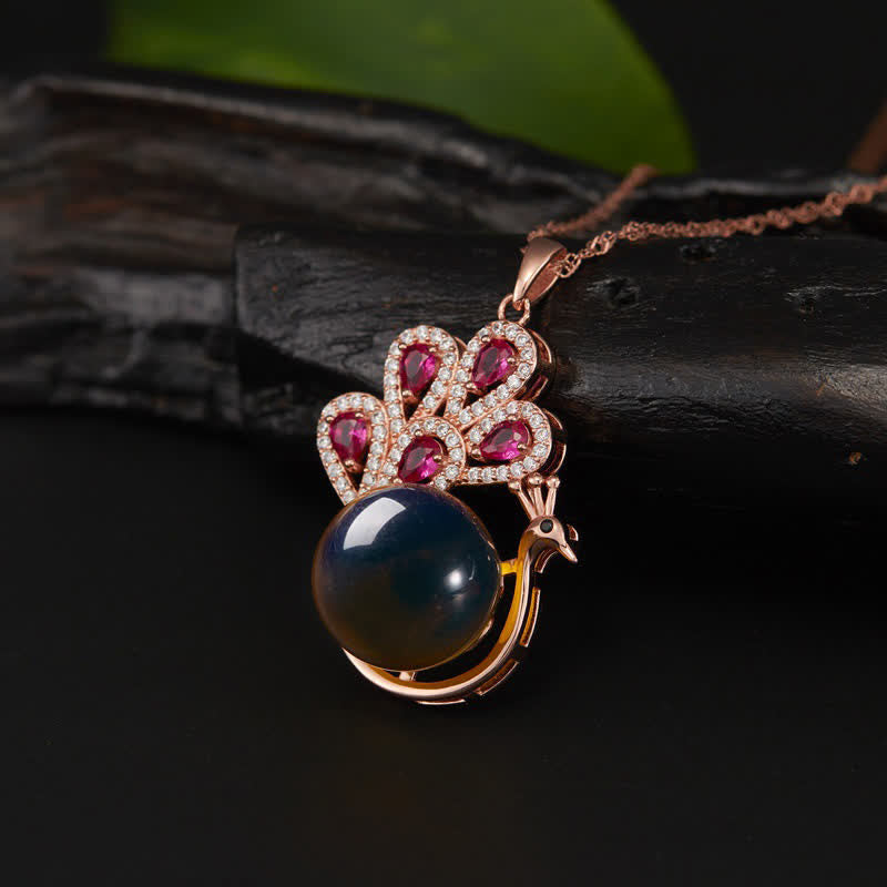 Collier et bague porte-bonheur en ambre paon | Sons de guérison