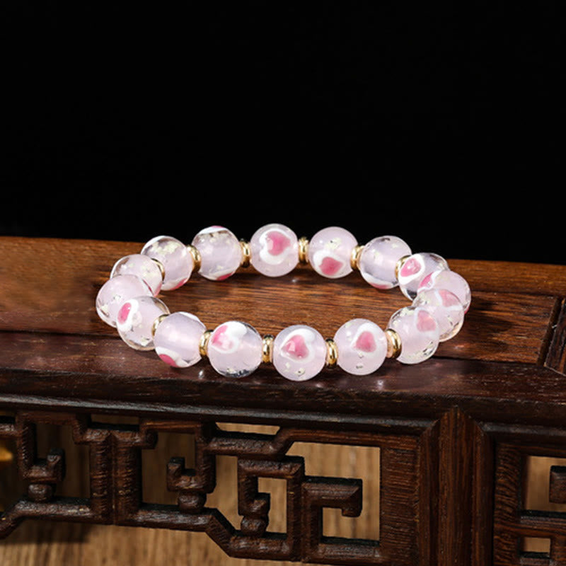 Bracelet spirituel en verre rose Liuli pour l'amour et la chance