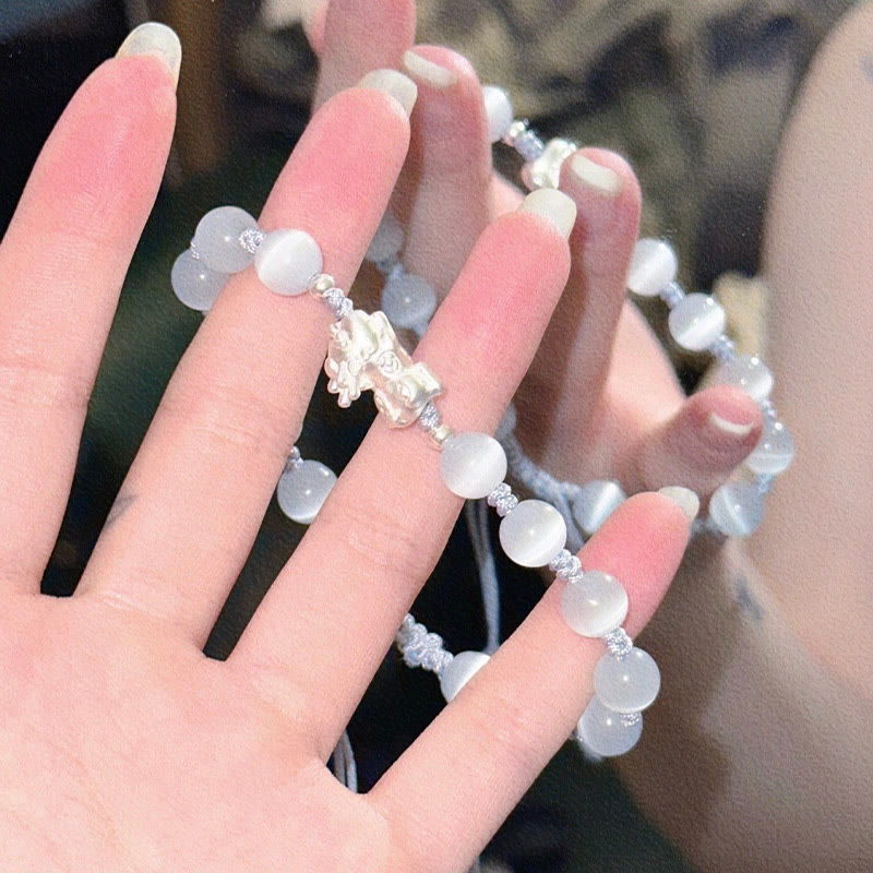 Bracelet de force en cristal rose œil de chat en obsidienne PiXiu