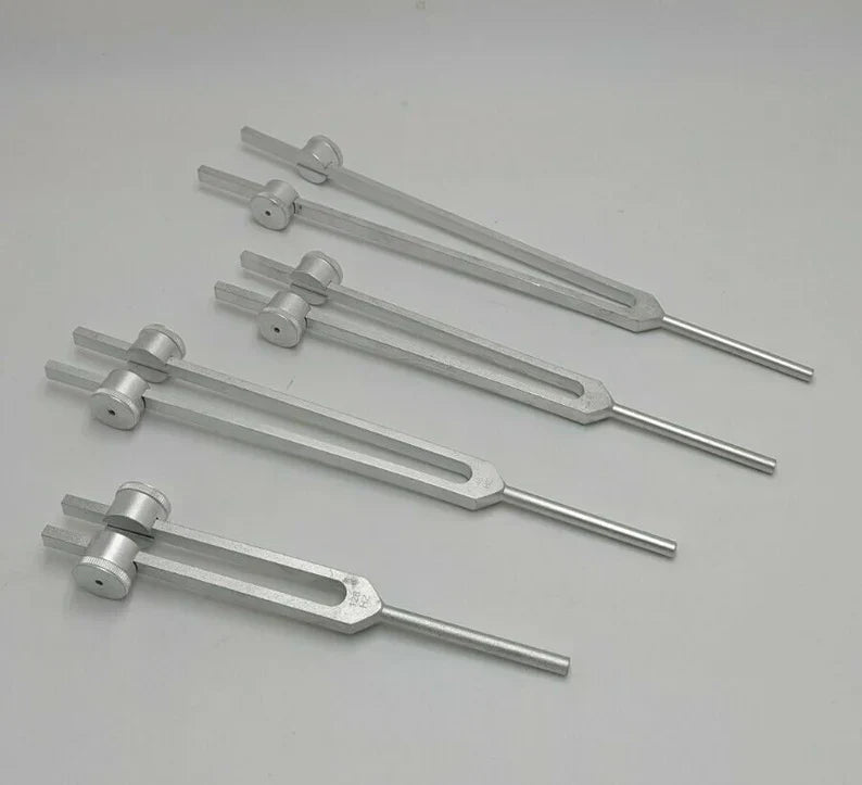 Four metal tuning forks in a row from the Professional Otto Tuners set