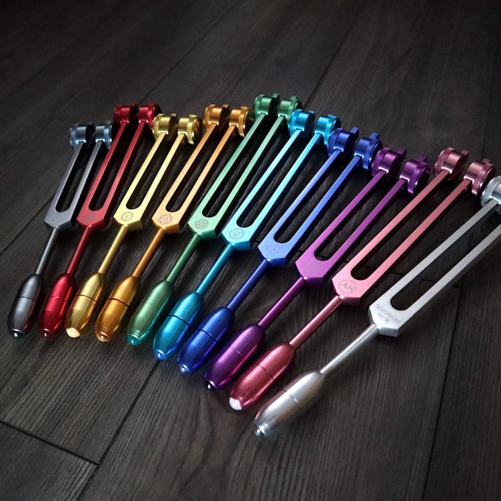 Colorful tuning forks in rainbow spectrum for Solfeggio 10pc Crystal Massage Set