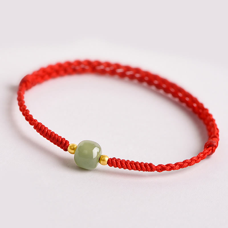 Bracelet de perles de jade de prospérité avec cordon rouge tressé