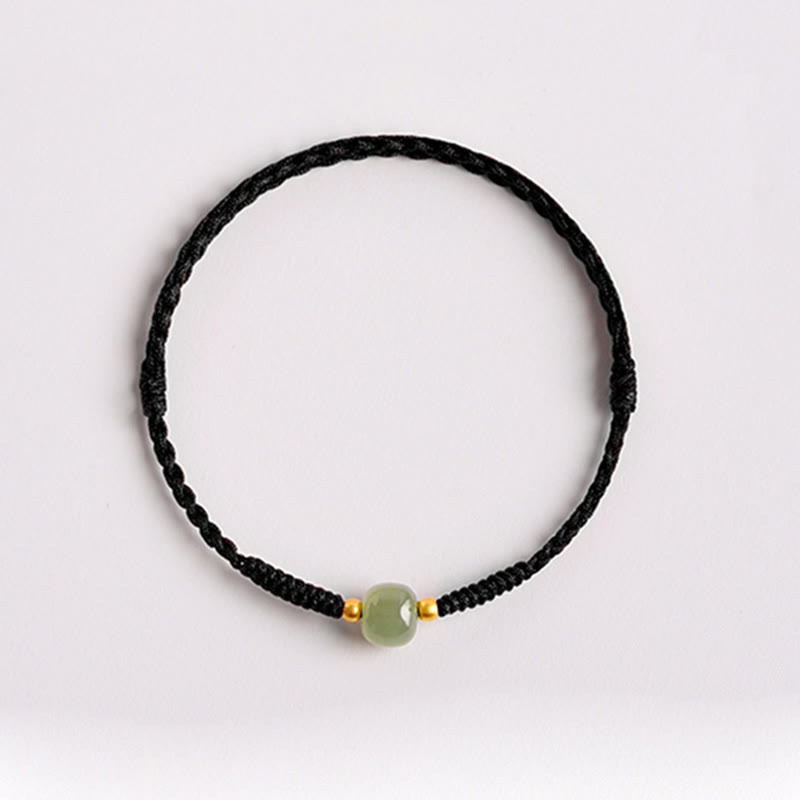 Bracelet de perles de jade de prospérité avec cordon rouge tressé