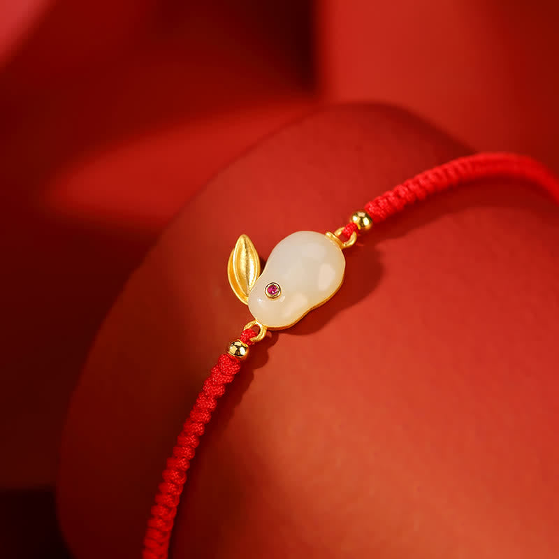 Bracelet de protection en jade blanc avec cordon rouge et breloque lapin