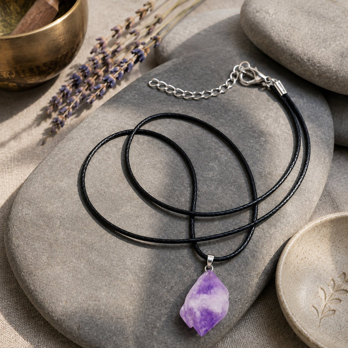 Raw Amethyst Crystal Pendant Necklace 16-19 Inch Meditation Jewelry, styled with a singing bowl and lavender