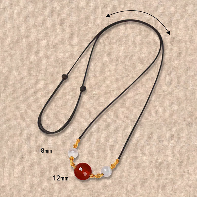 Bracelet ou collier tressé en agate rouge œil de chat calme