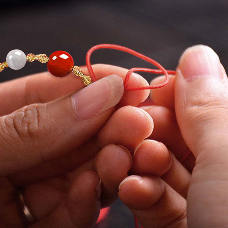 Bracelet ou collier tressé en agate rouge œil de chat calme