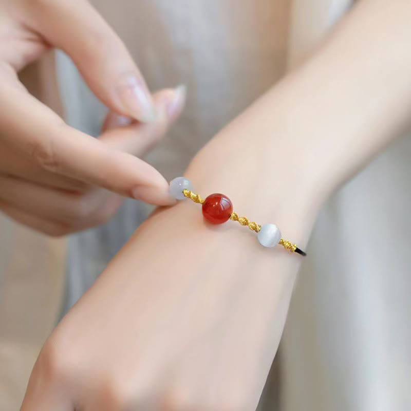Bracelet ou collier tressé en agate rouge œil de chat calme