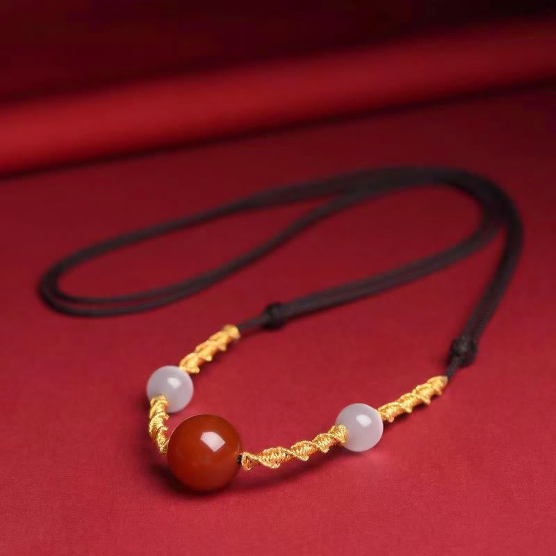 Bracelet ou collier tressé en agate rouge œil de chat calme