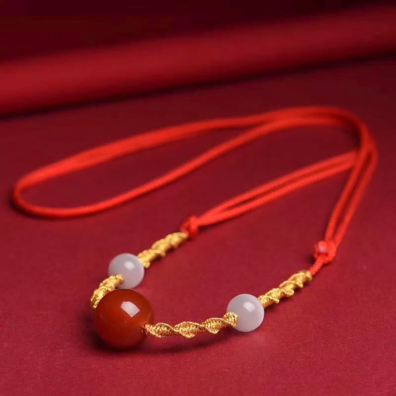 Bracelet ou collier tressé en agate rouge œil de chat calme