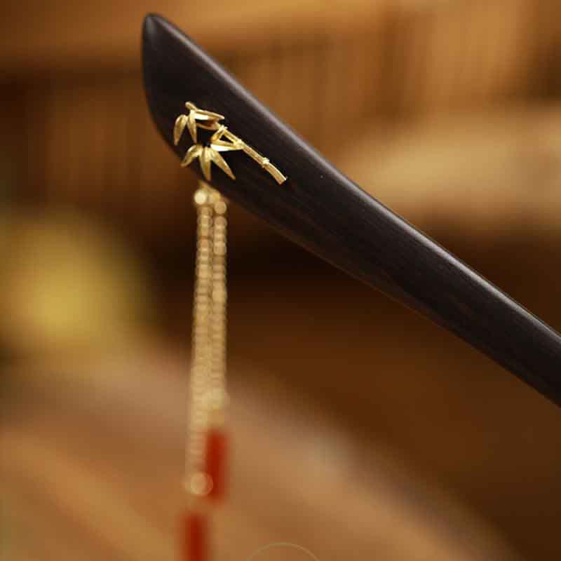 Épingle à cheveux chinoise en bois d'ébène et agate rouge avec pompon