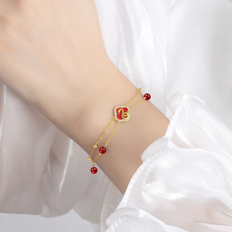 Bracelet porte-bonheur serpent en argent sterling et agate rouge