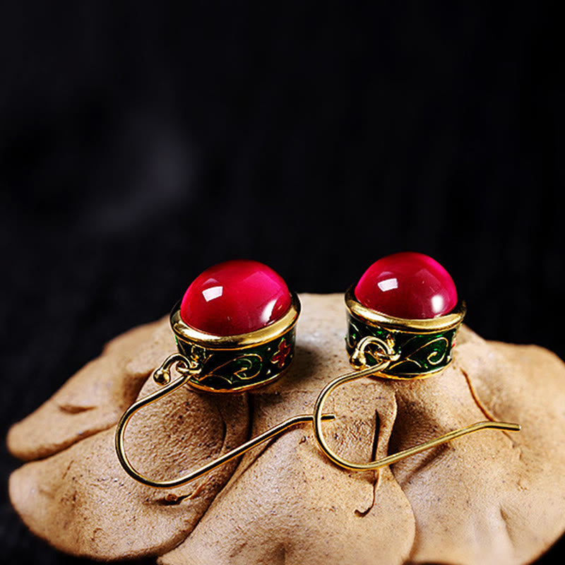 Boucles d'oreilles spirituelles en corindon rouge pour la confiance et le courage