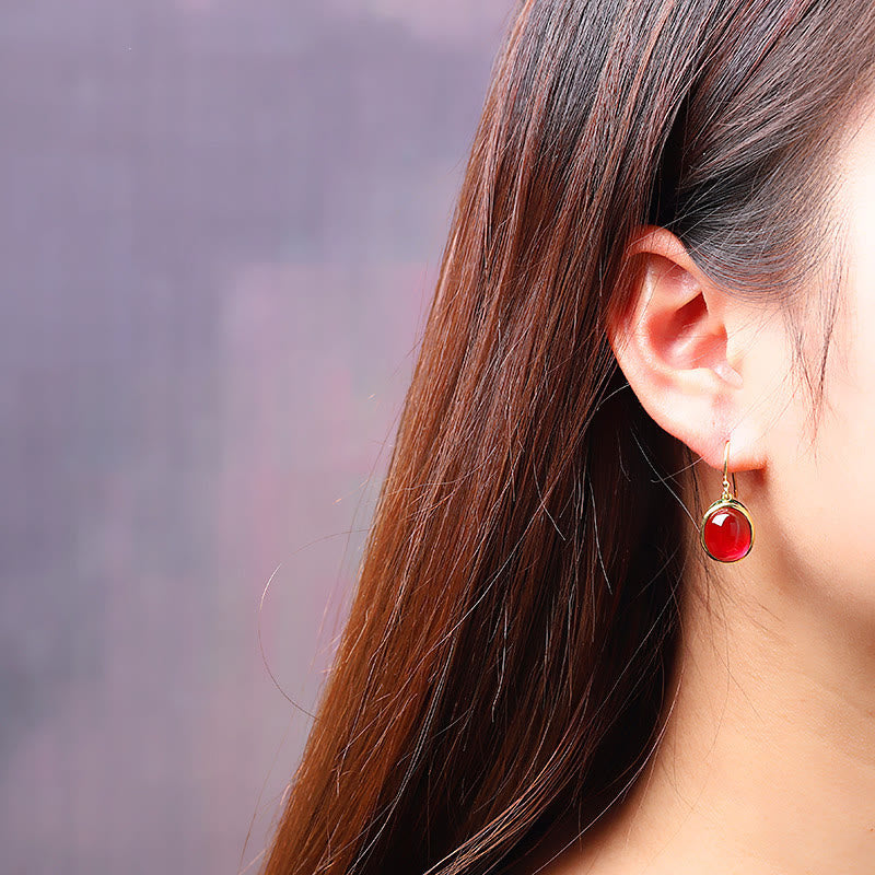 Boucles d'oreilles spirituelles en corindon rouge pour la confiance et le courage