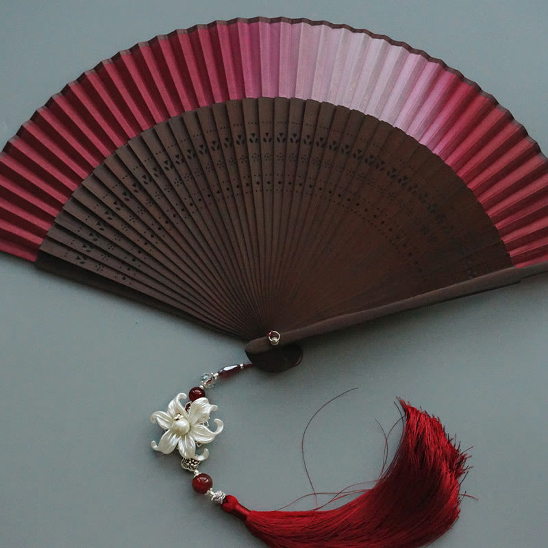 Éventail chinois pliant en bambou et soie Red Lily 22 cm