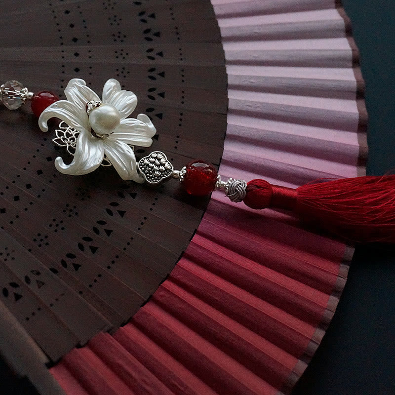 Éventail chinois pliant en bambou et soie Red Lily 22 cm