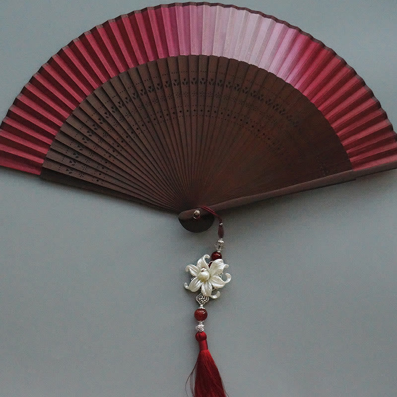Éventail chinois pliant en bambou et soie Red Lily 22 cm