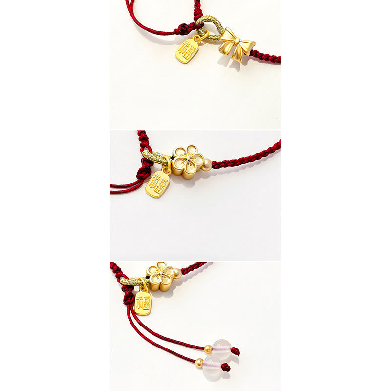Bracelet en fil rouge avec breloque Fu et détail fleur de pêcher