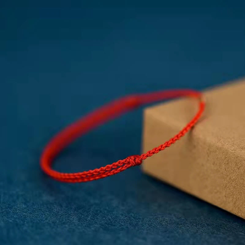 Bracelet fil rouge avec perles dorées porte-bonheur | Protection et chance