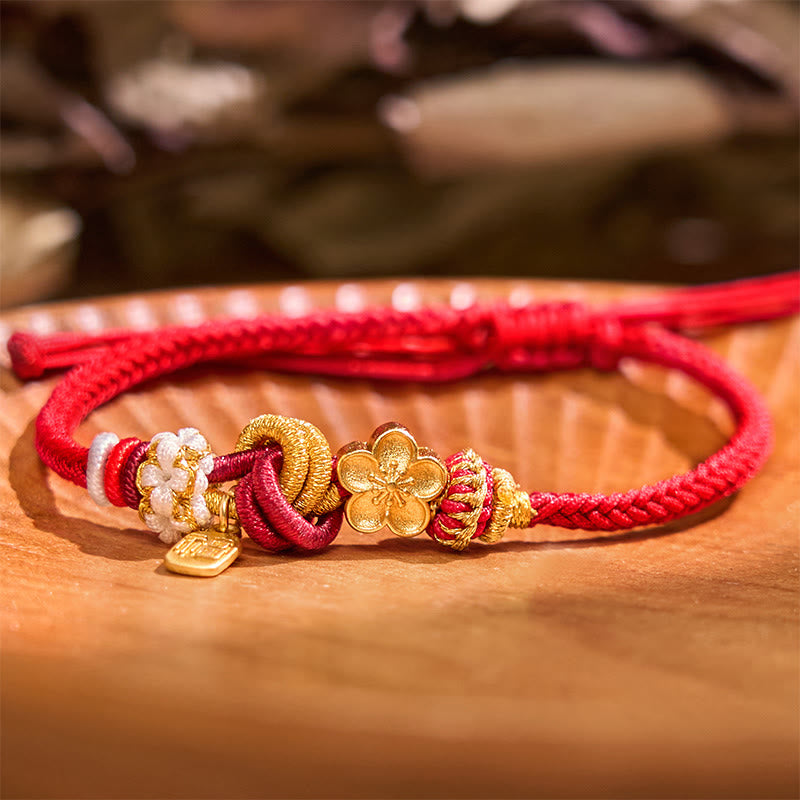 Bracelet en fil rouge avec breloque en fleur de pêcher pour la chance et la protection