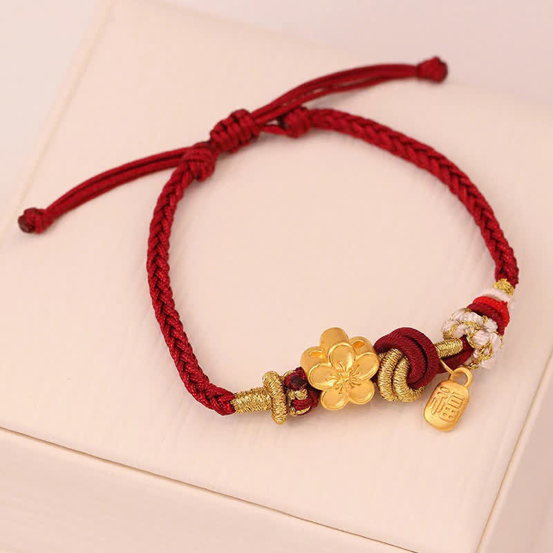 Bracelet en fil rouge avec breloque en fleur de pêcher pour la chance et la protection