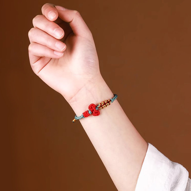 Bracelet fil rouge avec nœud Wenchang | Chance et force