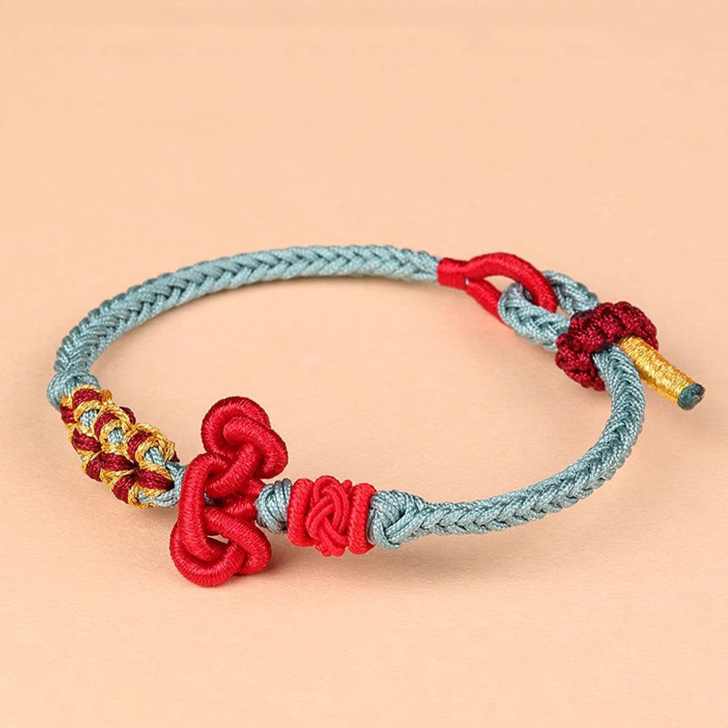 Bracelet fil rouge avec nœud Wenchang | Chance et force