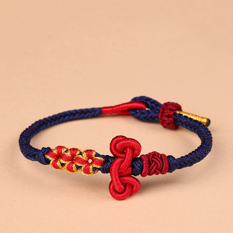 Bracelet fil rouge avec nœud Wenchang | Chance et force