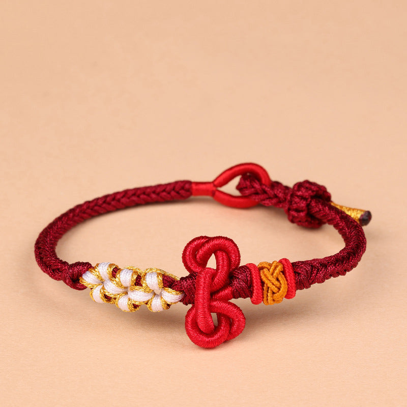 Bracelet fil rouge avec nœud Wenchang | Chance et force