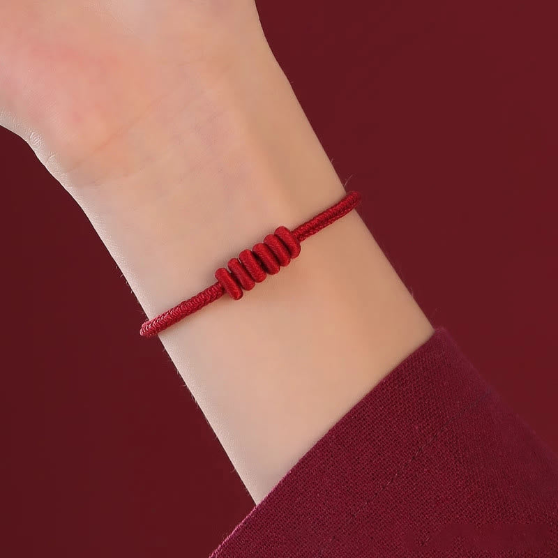 Bracelet de force à huit brins en corde rouge