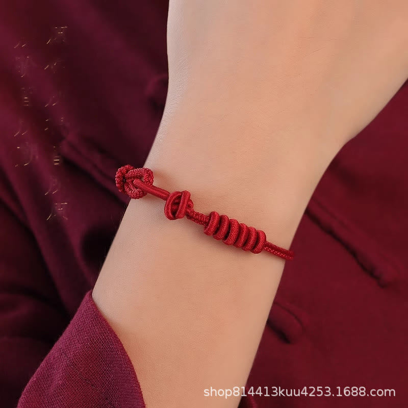 Bracelet de force à huit brins en corde rouge