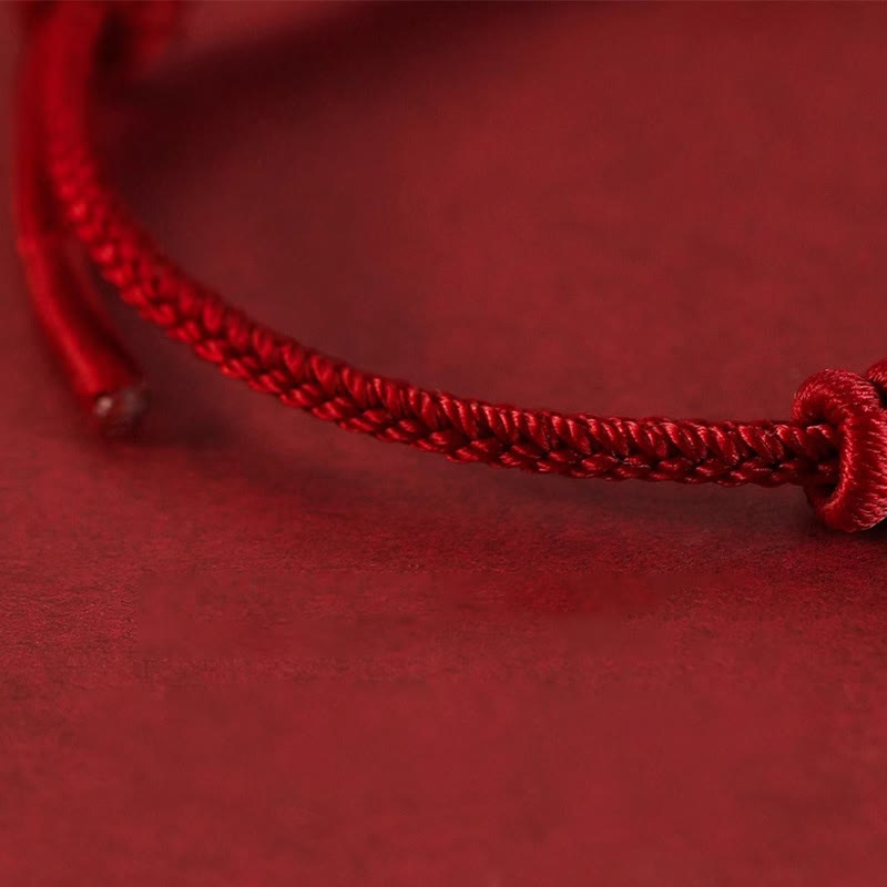 Bracelet de force à huit brins en corde rouge