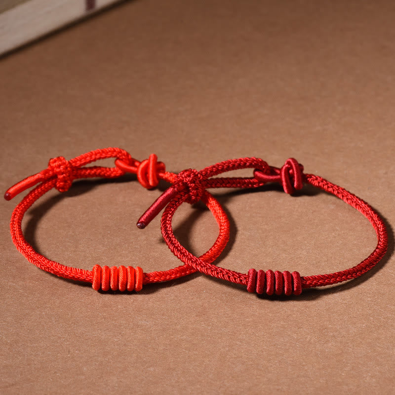 Bracelet de force à huit brins en corde rouge