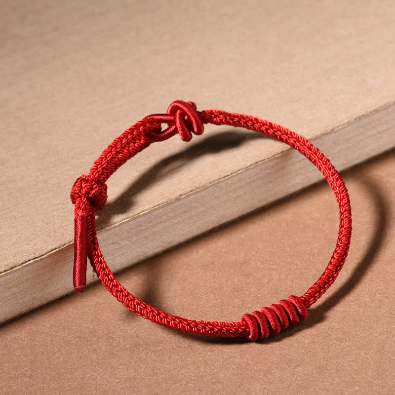 Bracelet de force à huit brins en corde rouge