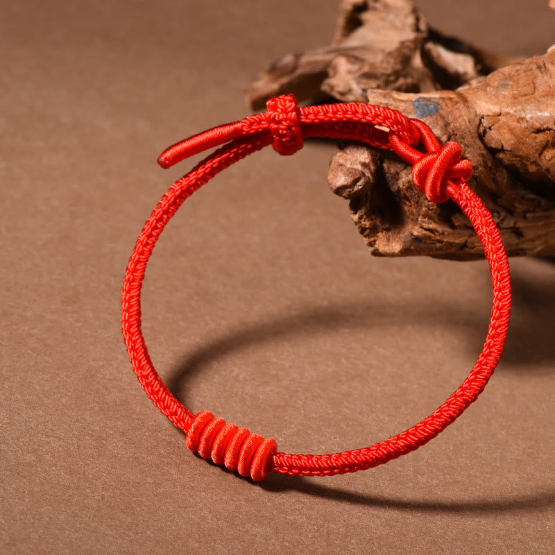 Bracelet de force à huit brins en corde rouge