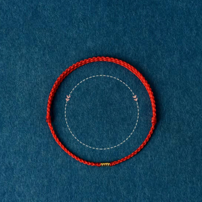 Bracelet de cheville porte-bonheur en perles dorées à fil rouge