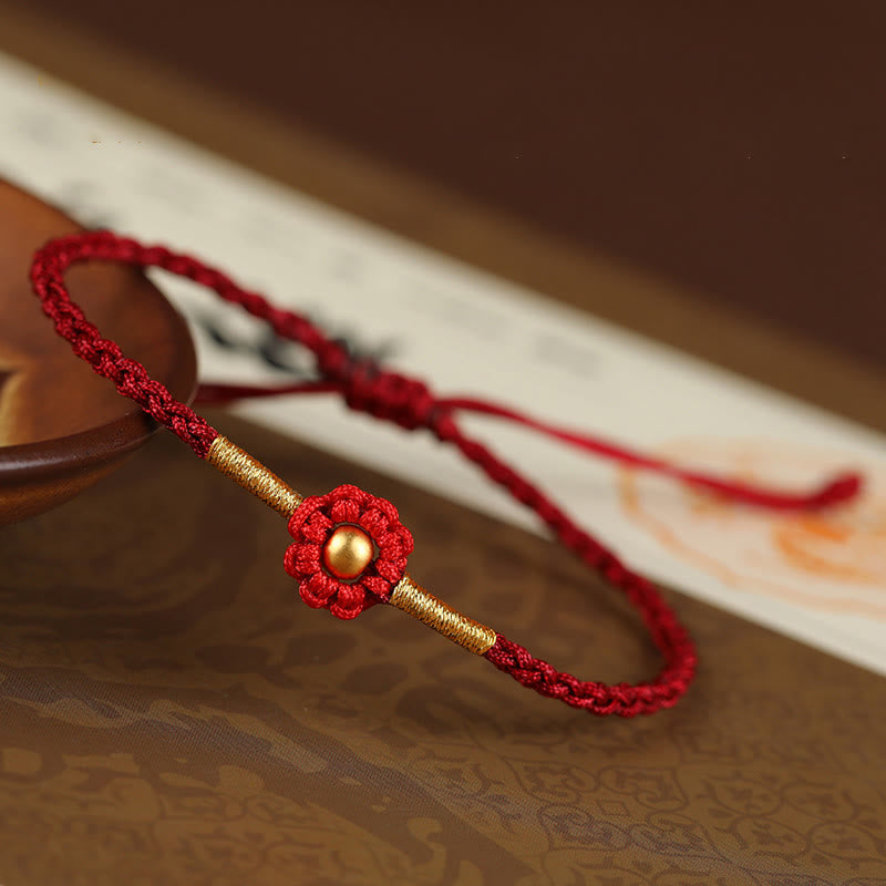 Bracelet de protection en fil rouge avec fleur dorée