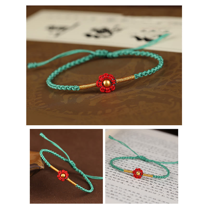 Bracelet de protection en fil rouge avec fleur dorée