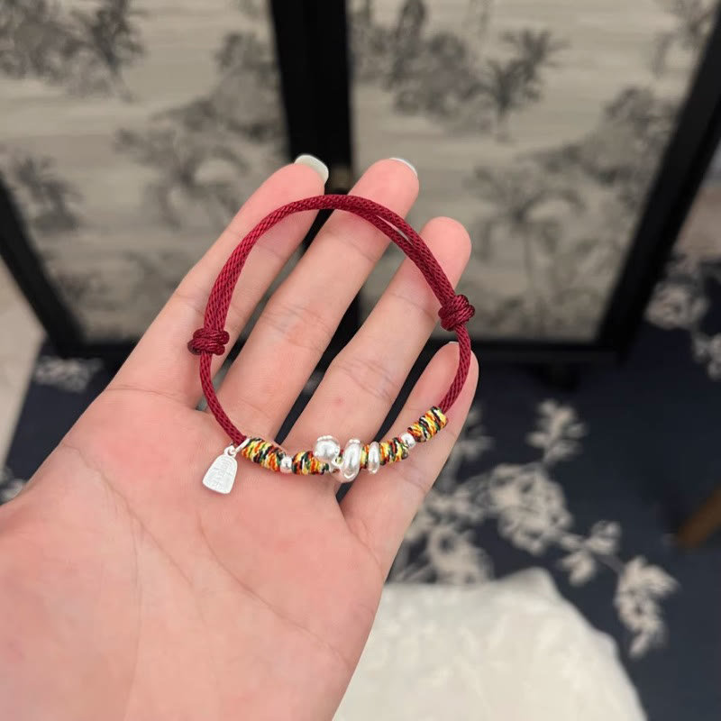 Bracelet de protection serpent en fil rouge et argent