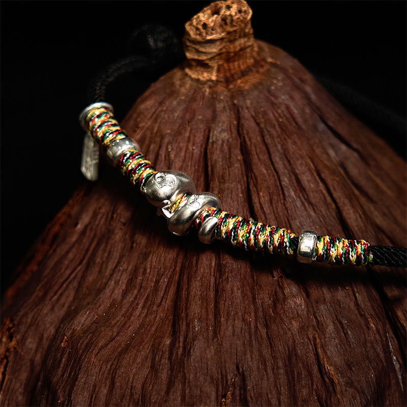 Bracelet de protection serpent en fil rouge et argent