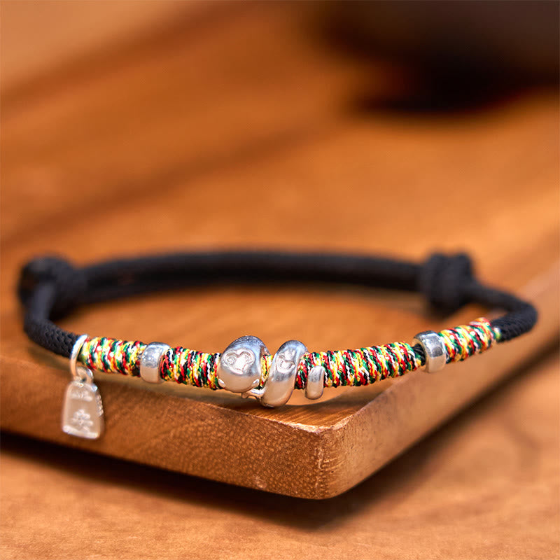 Bracelet de protection serpent en fil rouge et argent