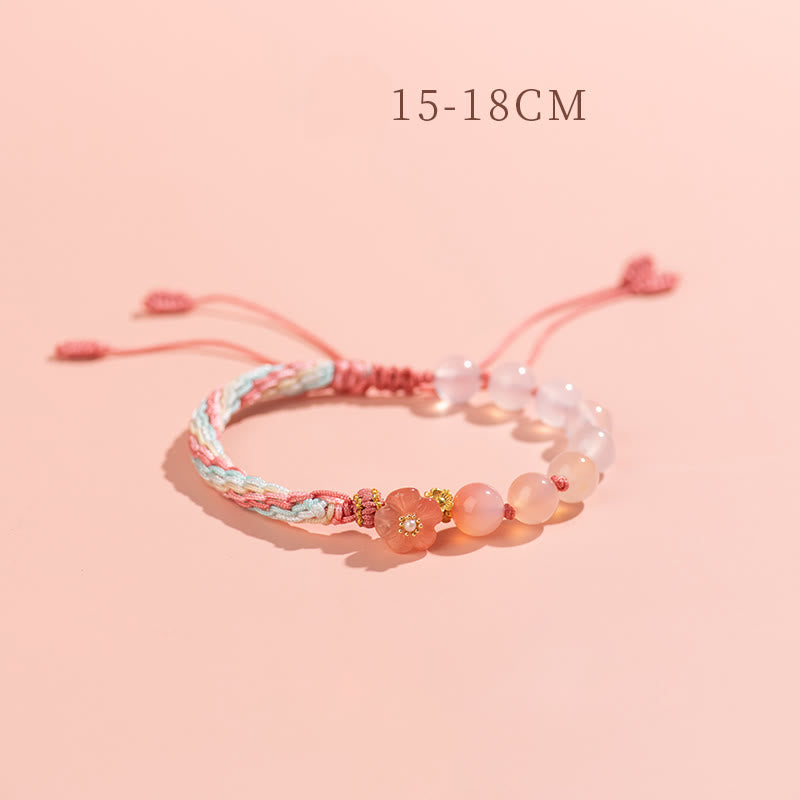 Bracelet en agate à nœud de réincarnation avec breloque en fleur de pêcher