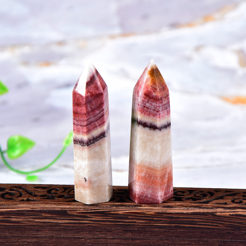 Tour de cristal de rhodochrosite pour l'équilibre émotionnel