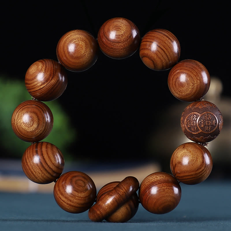 Bracelet zodiaque chinois en bois de rose avec pièce de cuivre sculptée pour le calme