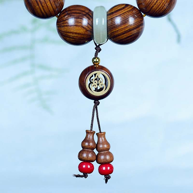 Bracelet spirituel à breloques en calebasse de bois de rose pour une protection calme