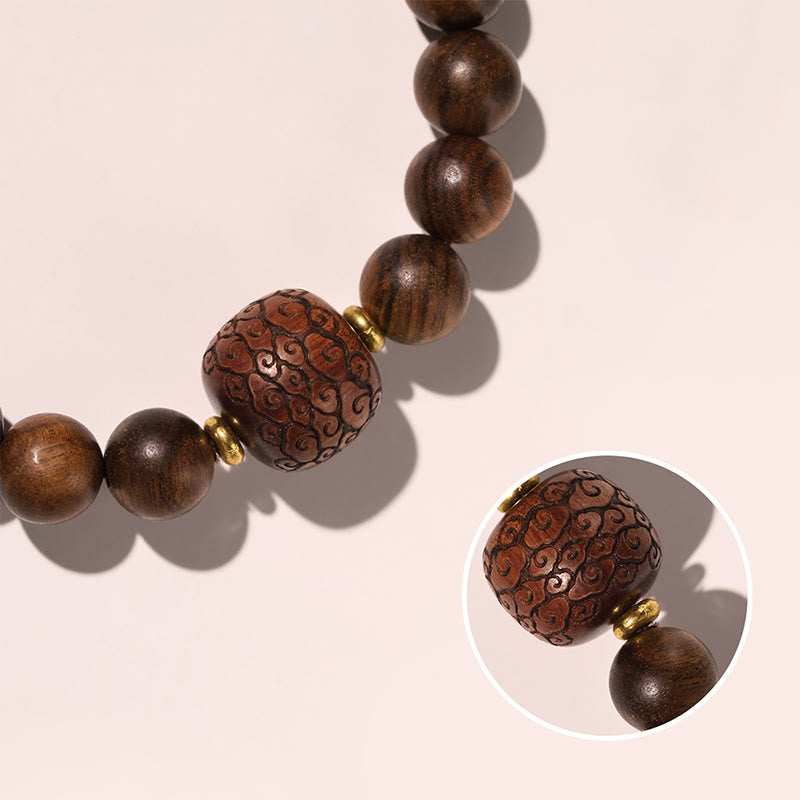 Bracelet spirituel en bois de rose avec le symbole Fu | Chaleur et chance