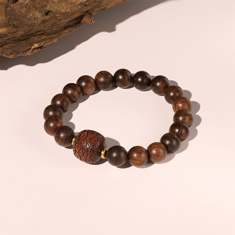 Bracelet spirituel en bois de rose avec le symbole Fu | Chaleur et chance