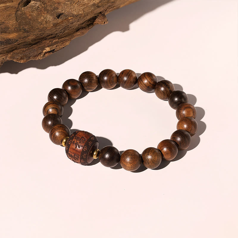 Bracelet spirituel en bois de rose avec le symbole Fu | Chaleur et chance