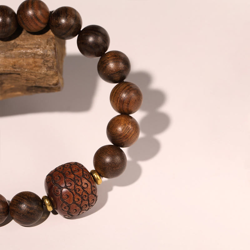 Bracelet spirituel en bois de rose avec le symbole Fu | Chaleur et chance