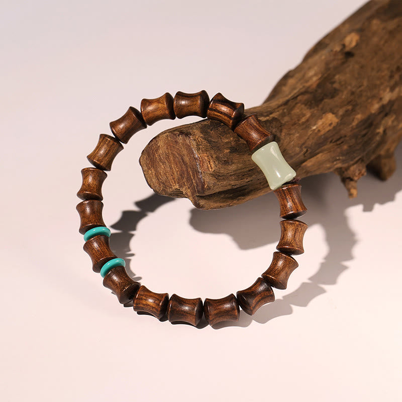 Bracelet spirituel en bois de rose avec le symbole Fu | Chaleur et chance